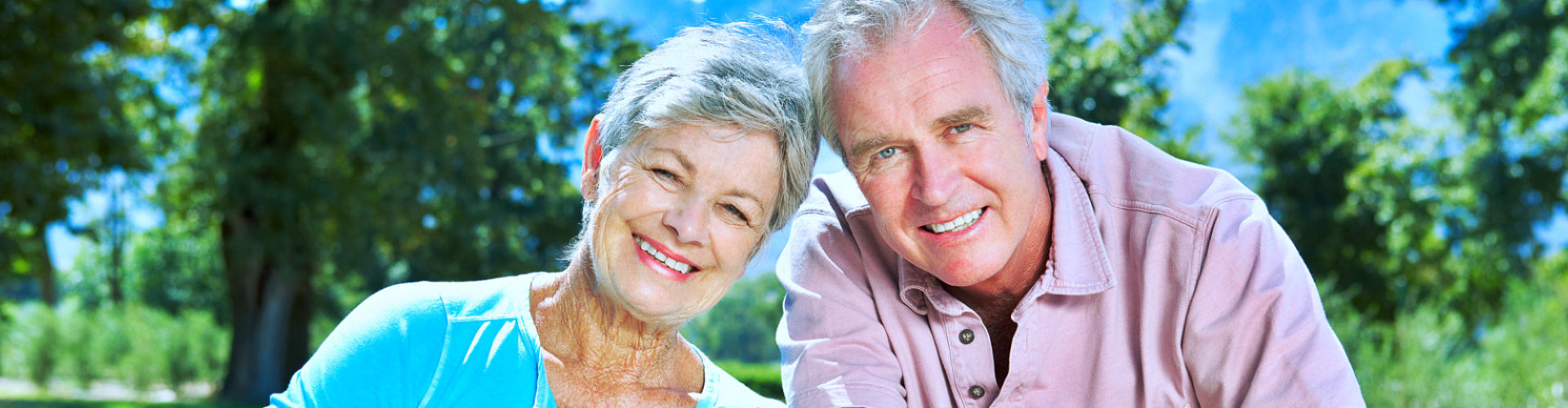 elderly couple smiling