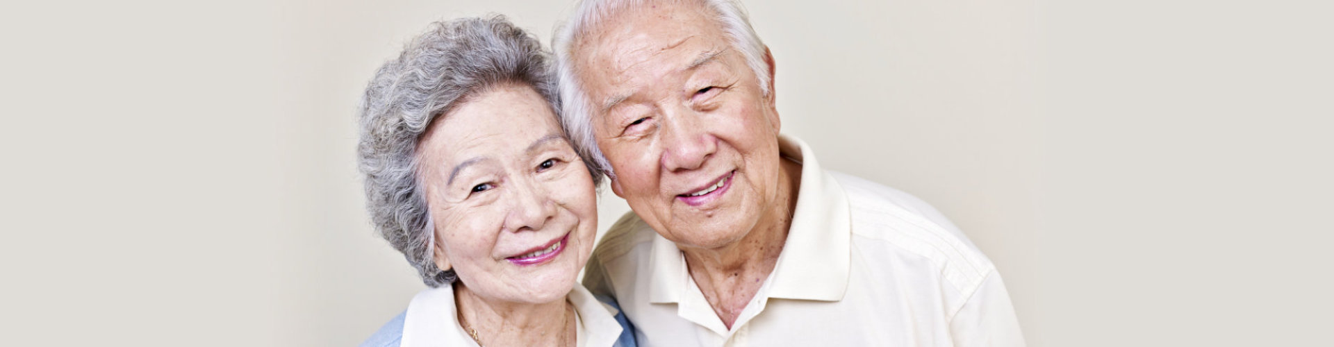 elderly couple smiling